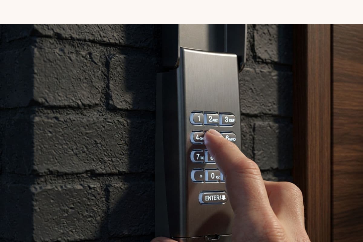 Homeowner troubleshooting a wireless garage door keypad mounted outside the garage door